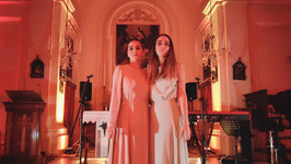 Bettina Muchmore and Philipa Naudi standing in a chapel