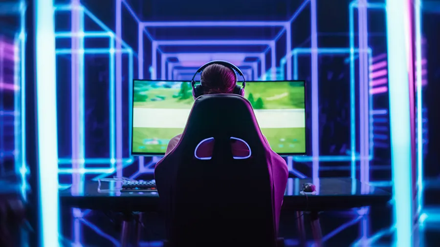 Female Online Gamer Playing Video Game in a Futuristic Cyberpunk Room