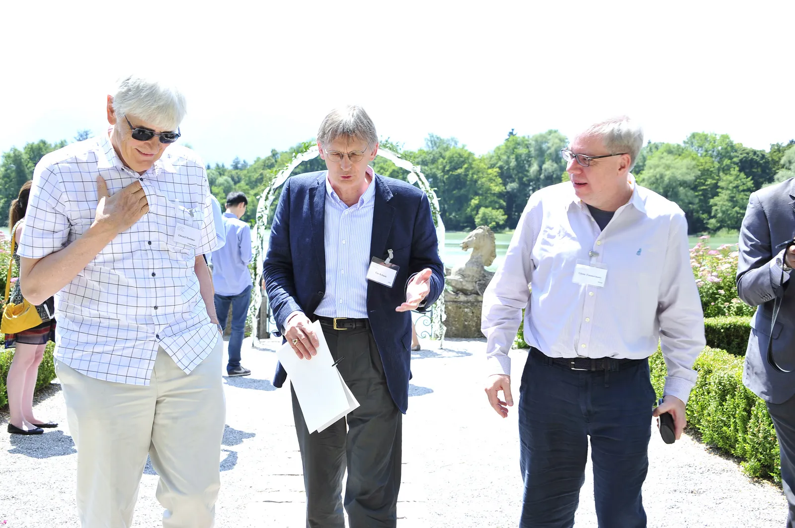 Three Men Walking in the Garden of Schloss Leopoldskron