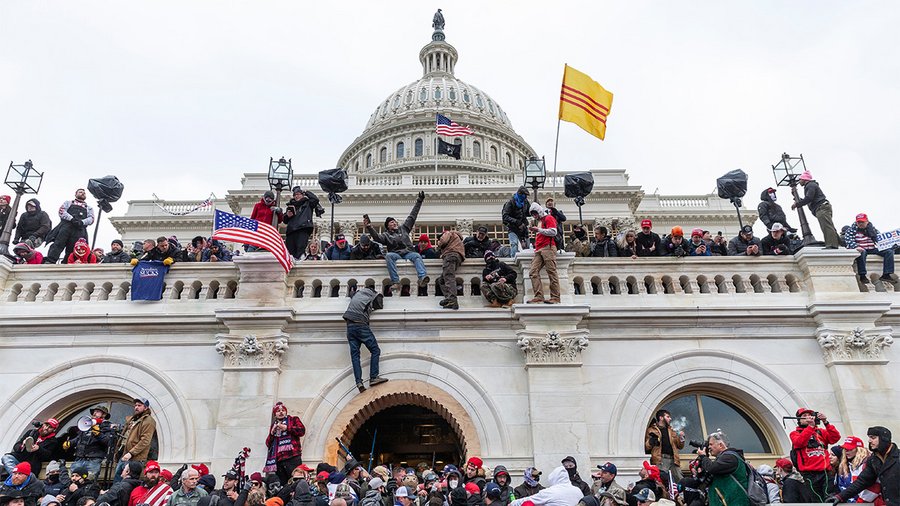 Protesters seen all over Capitol building where pro-Trump supporters riot and breached the Capitol on January 6, 2021