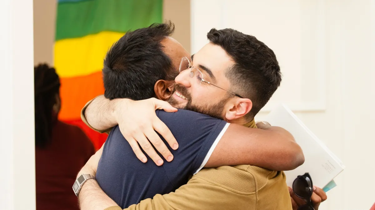 Two Men Hugging