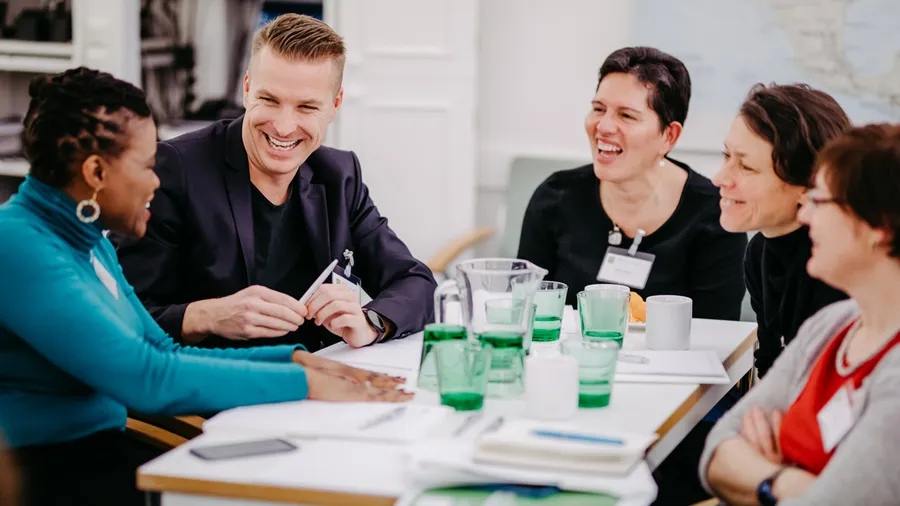 Participants in discussion during a plenary session held in Parker Hall