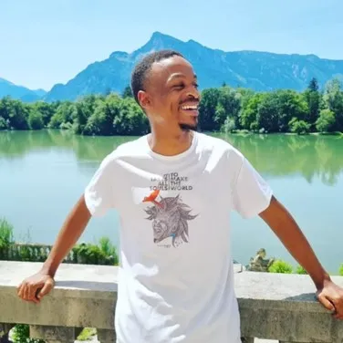 Man outside the castle laughing