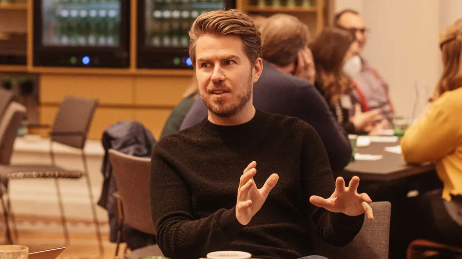 Miles Taylor deep in discussion at Democracy on the Front Lines: Polarization, Culture and Resilience in America and the World