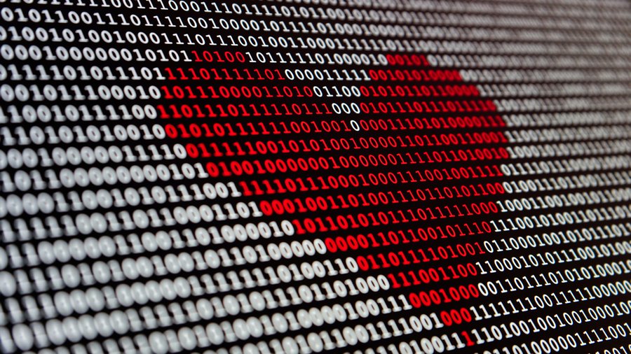 Red heart made out of binary digits.