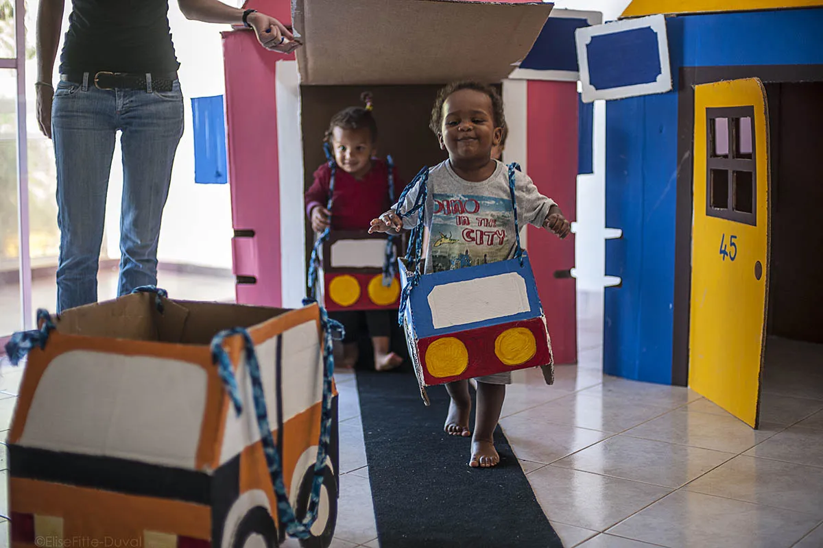 Two Children Play Indoors