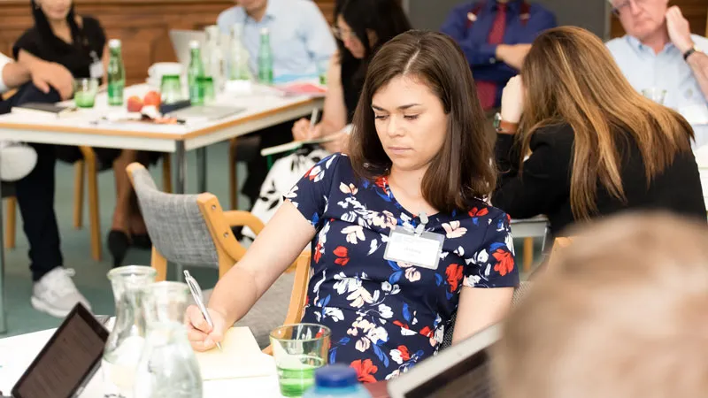 Ashley Finger taking notes at the annual meeting of the Public Sector Strategy Network