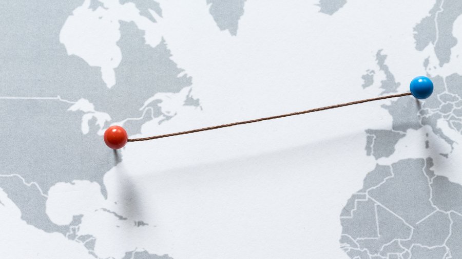  A map of the world with two points connecting the U.S. and Europe