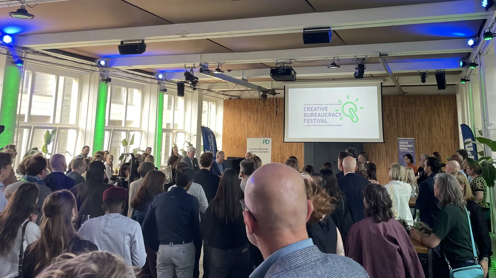 a picture of a room full of people at the Creative Bureaucracy Festical