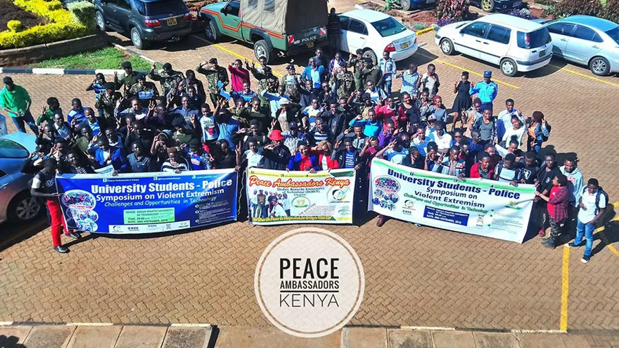 A group photo taken at the University Students & Police Symposium on Countering Violent Extremism hosted by Dedan Kimathi University Peace Club in November, 2018
