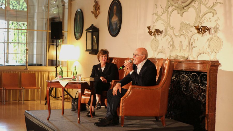 Helga Rabl-Stadler, president of the Salzburg Festival, in conversation with actor Michael Heltau in Schloss Leopoldskron's Great Hall