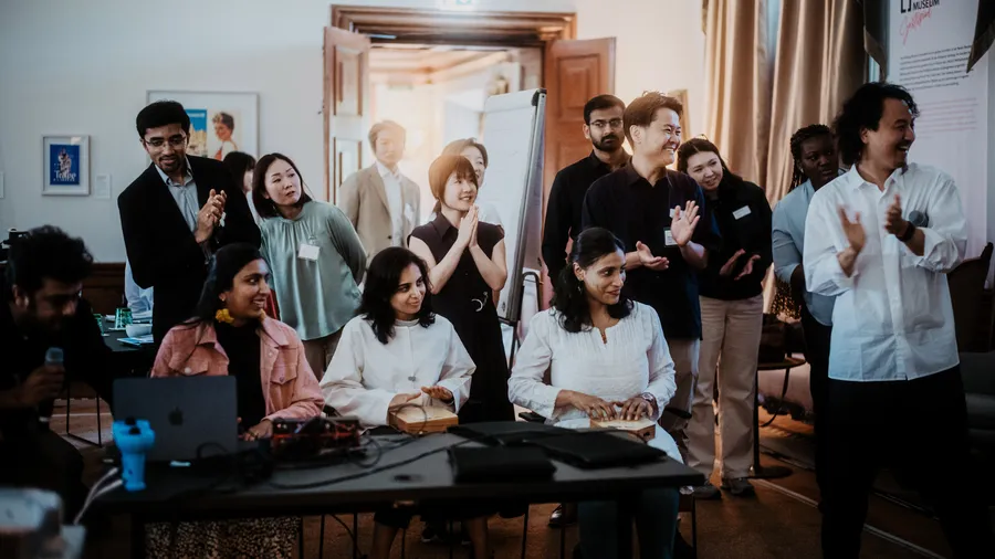 A group of Indian, Japanese, and other Fellows engaged in discussions during the Japan-India Transformative Technology Network in 2025.