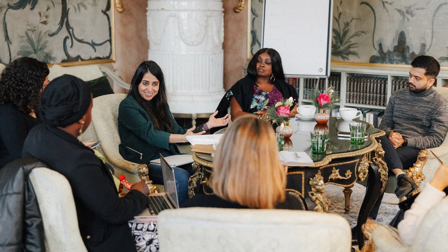 Participants of "The Future of Teaching" posing for a group photo outside Schloss Leopoldskron