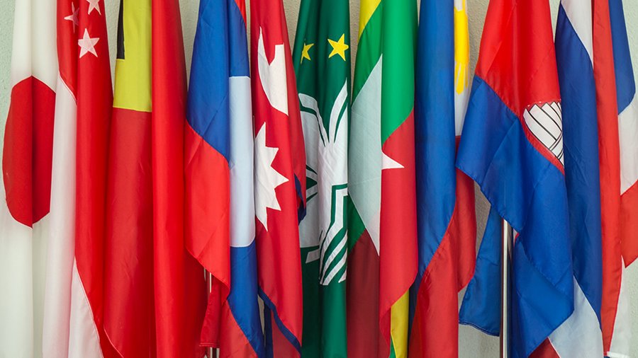 a row of flags from various Asian countries