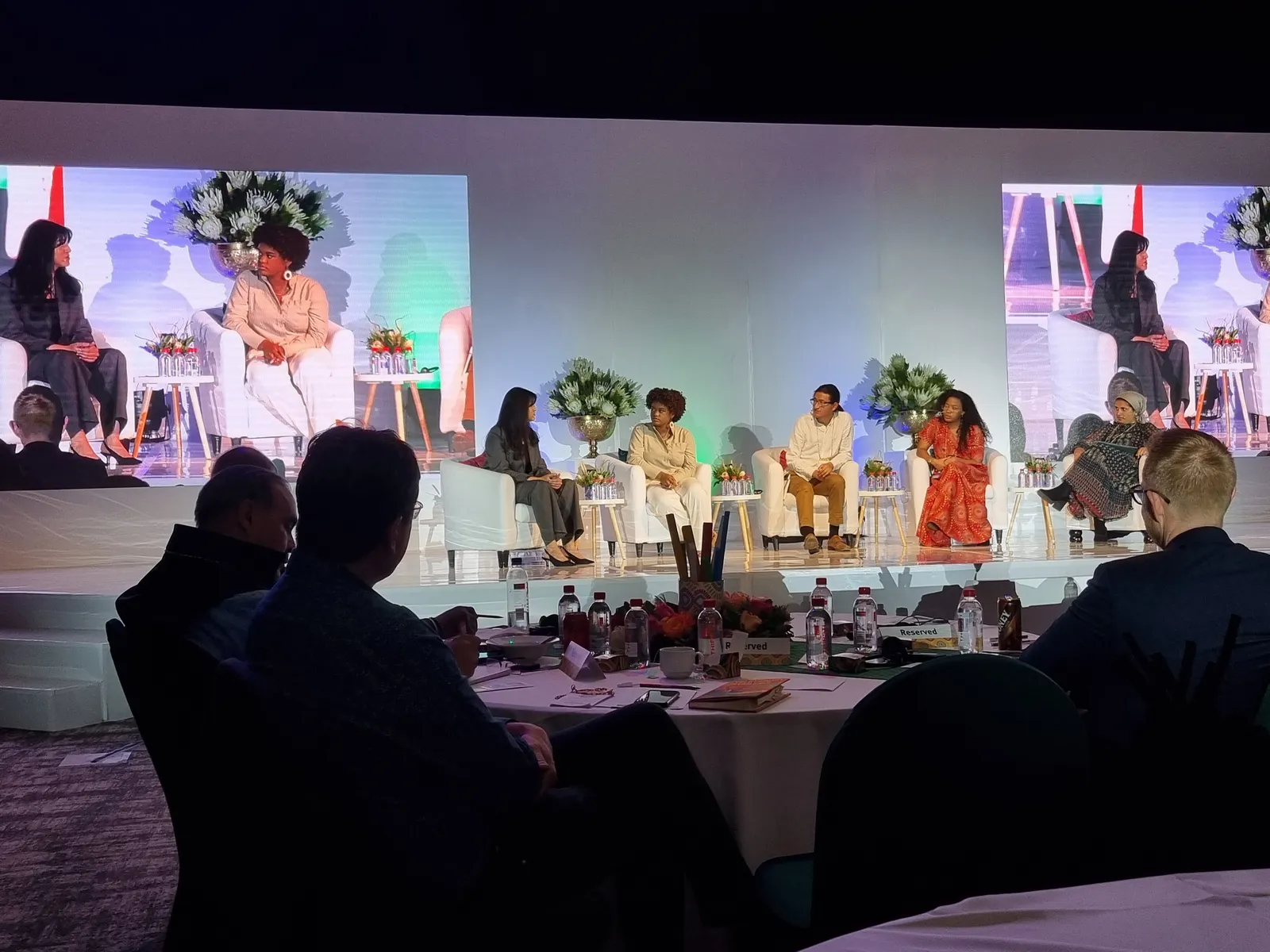 People Talking on a Podium 