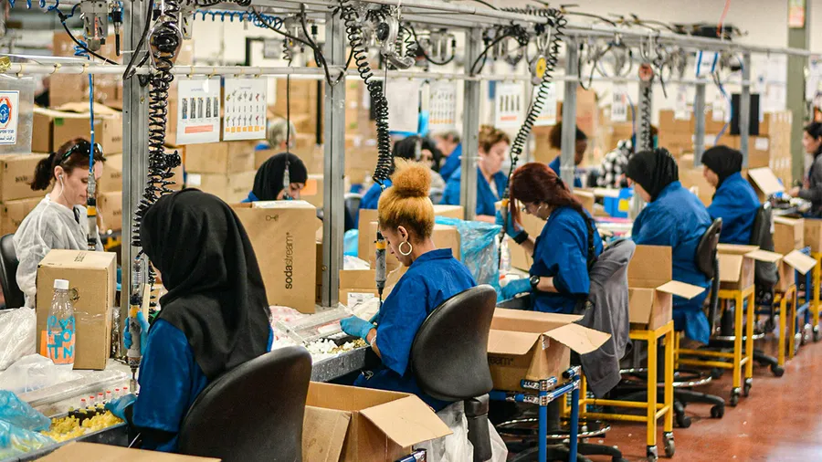 Women working on SodaSteam devices at the SodaStream factory in Israel.