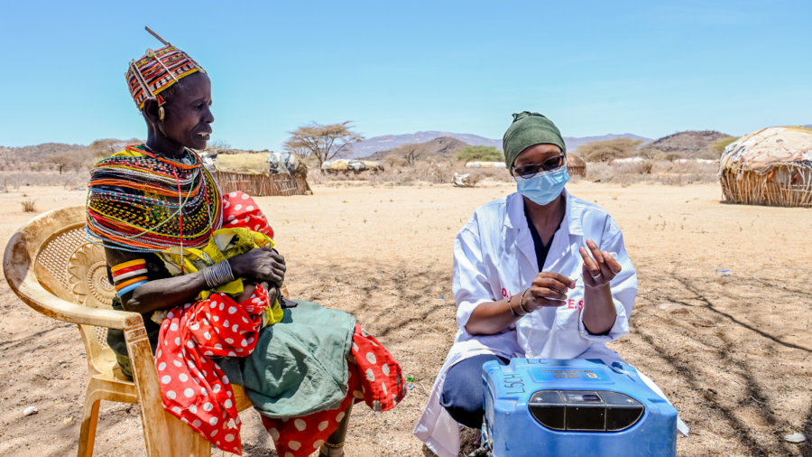 A woman gets a vaccine in Kenya