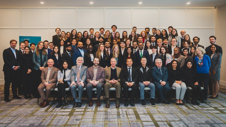 A group of individuals posing for a group photo at the Salzburg Cutler Fellows Program in February 2026.