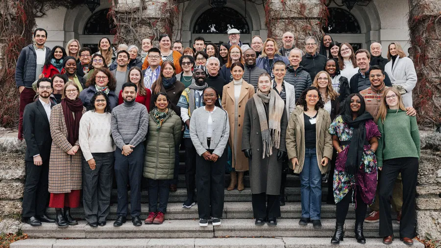 Participants of "The Future of Teaching" posing for a group photo outside Schloss Leopoldskron
