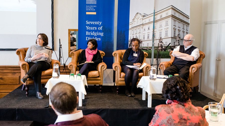 Participants attend a panel in the Robison Gallery