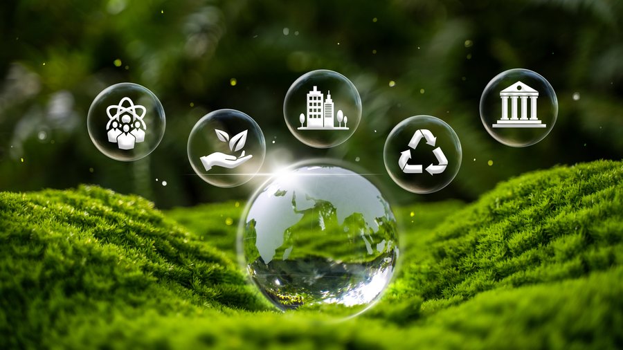 A glass globe surrounded by lush greenery symbolizes sustainability, with floating icons representing community, nature, urban development, recycling, and governance.