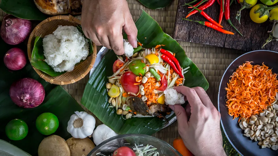 Picture of various foods and person preparing a meal