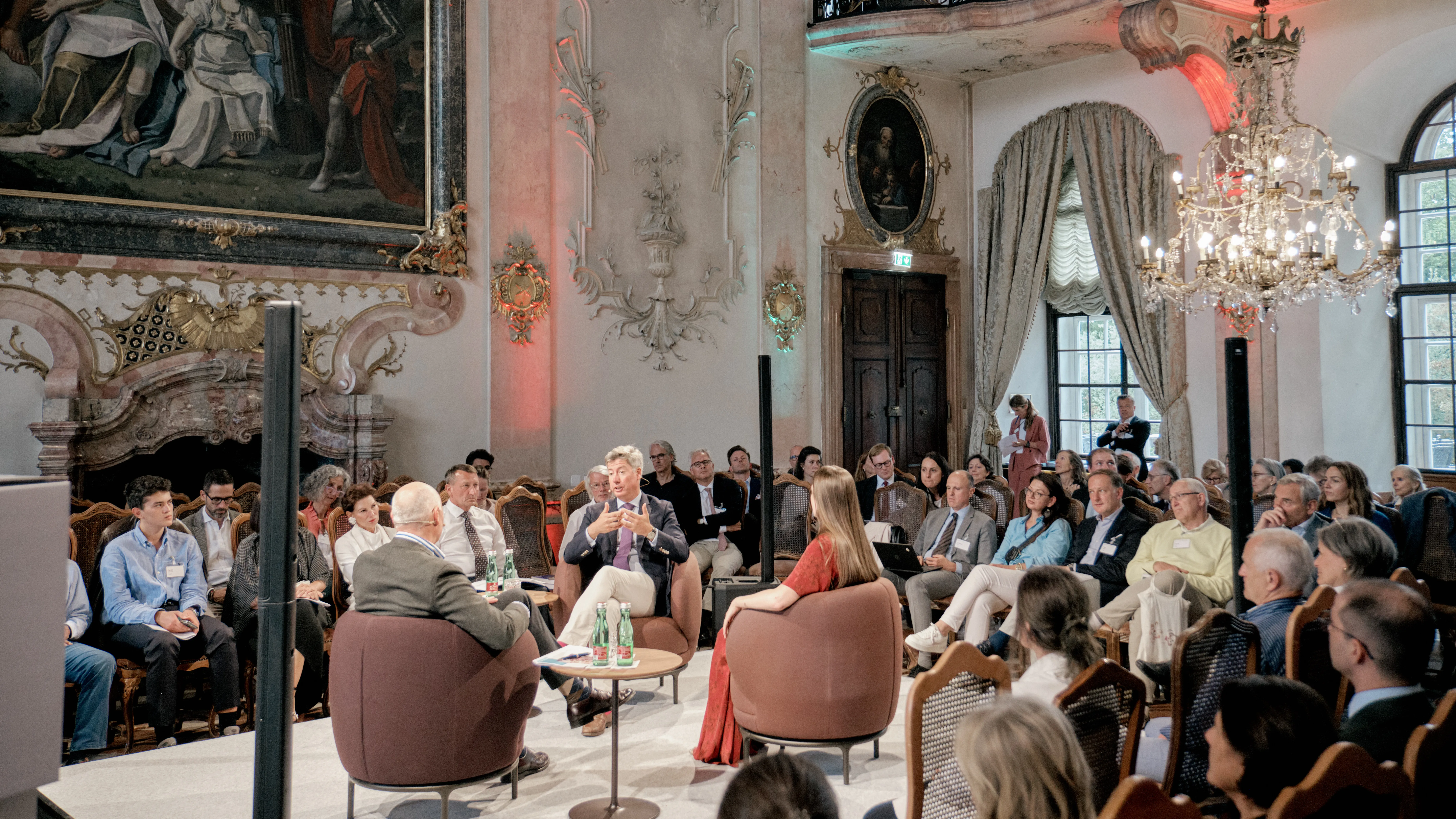 a group in the Marble Hall of Schloss Leopoldskron during the 2025 Future Forum