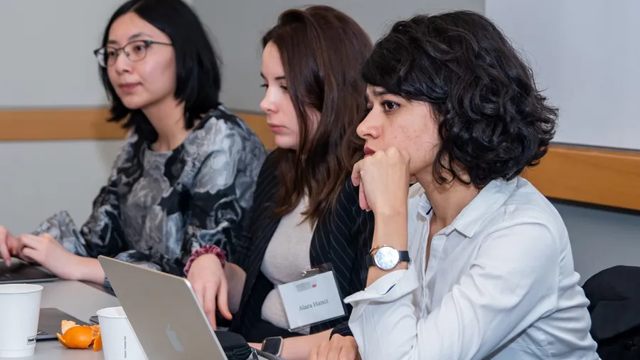 A photo of Harshitha Kasarla and two other Cutler Fellows at the 11th Salzburg Cutler Fellows Program in 2023