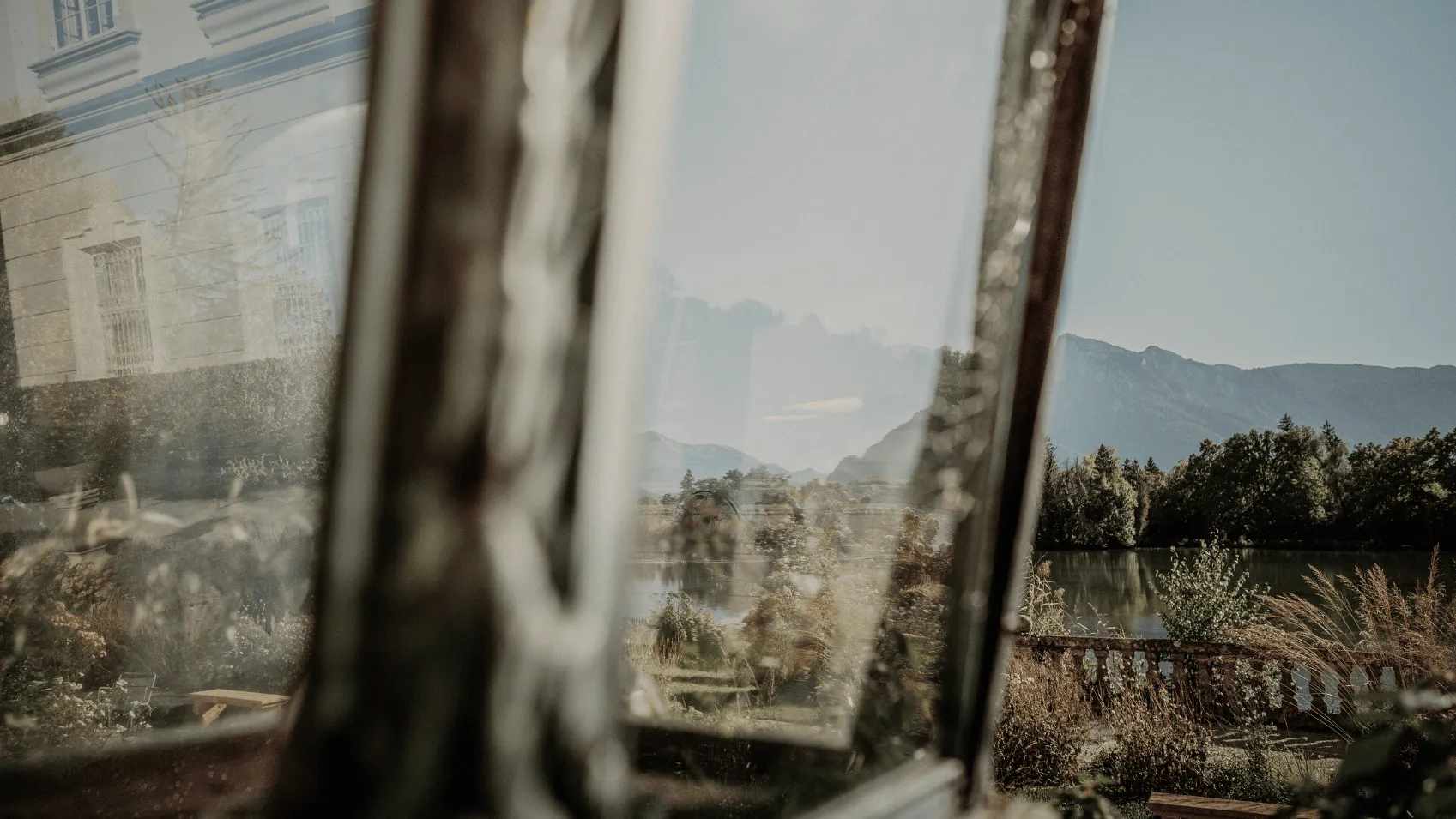 a photo of the Schloss Leopoldskron through a reflection