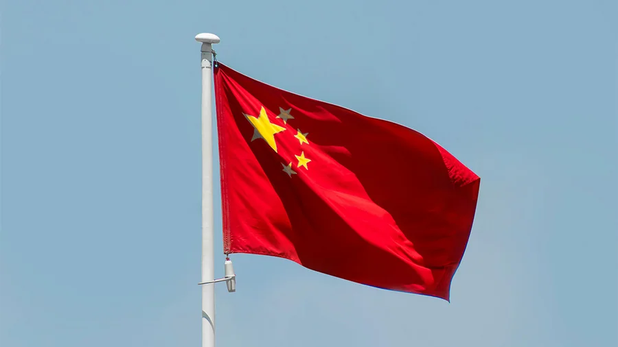 Chinese flag blowing in the wind